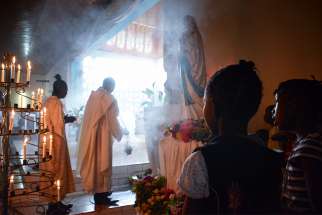 Faithful attend a Mass at St. Savior Catholic Church in Bangui, Central African Republic, in this 2015 file photo. The country&#039;s Christian and Muslim leaders designated May 10-12 as days of prayers for peace and reconciliation. 