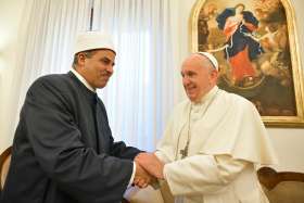 Pope Francis shakes greets Mohamed Husin Abdelaziz Hassan, president of al-Azhar University, during a Sept. 11, 2019, meeting at the Vatican. The pope met with the committee working to fulfill the goals of the &quot;Document on Human Fraternity for World Peace and Living Together.&quot;