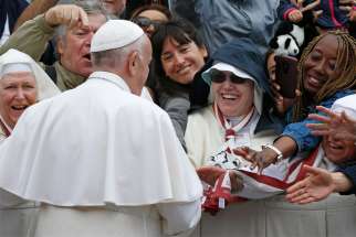 Pope Francis greets people during his general audience in St. Peter&#039;s Square at the Vatican May 29, 2019. 