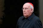 Cardinal Sean Brady of Armagh, Northern Ireland, leaves a meeting of cardinals in the synod hall at the Vatican in this Feb. 20, 2014, file photo. Pope Francis accepted the resignation of Cardinal Brady Sept. 8. Cardinal Brady had served as archbishop of Armagh since 1996 and submitted his resignation upon reaching the reached the mandatory age of 75.