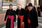 Late Cardinal Bernard F. Law and Cardinal Agostino Cacciavillan (right), former apostolic nuncio to the United States, leave after Pope Francis&#039; audience with members of the Roman Curia in Clementine Hall at the Vatican Dec. 22, 2014.