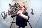 Kim Tait from the Royal Ontario Museum holding a slice of shergottite meteorite.