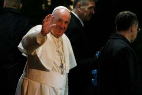 Pope Francis waves as he arrives for a meeting with the bishops of Japan at the apostolic nunciature in Tokyo Nov. 23, 2019.