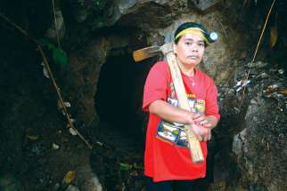 Vicklyn Ebanes, 44, poses outside a small-scale gold mine she operates with her husband in the Diwalwal area on the Philippines’ southern island of Mindanao. The Canadian government has objected to a UN resolution to advance rights of indigenous peoples.