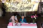 Eleanor Murphy had to keep a pane of glass between her and her family for her 100th birthday.