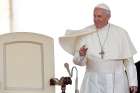 Pope Francis waves during his general audience June 14 in St. Peter&#039;s Square at the Vatican.