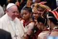 Pope Francis greets Sri Lankan dancers after a Mass for Sri Lankan pilgrims in St. Peter&#039;s Basilica at the Vatican Feb. 8. The pope arrived after Mass and greeted an estimated 12,000 Sri Lankans living in Italy who were in attendance.
