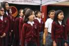 Grade 5 students sing “O Canada” at the opening of the new fine arts annex at St. Mary’s Elementary School in Vancouver.