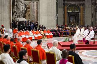 Pope Francis listens as Cardinal Angelo Acerbi, a 99-year-old retired Vatican diplomat, thanks him on behalf of the 21 new cardinals created at a consistory Dec. 7, 2024, in St. Peter&#039;s Basilica at the Vatican.