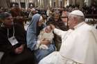 Pope Francis says goodbye to the people playing Mary, Jesus and Joseph in a living Nativity scene at Rome&#039;s Basilica of St. Mary Major Dec. 14, 2024.