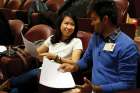 Indonesian synod observer Anastasia Indrawan talks with an unidentified synod observer before a session of the Synod of Bishops on young people, the faith and vocational discernment at the Vatican Oct. 23. 