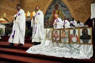 Priests celebrate Mass for citizens killed in recent protests at the Cathedral of Our Lady of Congo in Kinshasa, Congo, Feb. 9. 