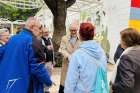 Canadian Catholic Cardinal Michael Czerny greeting people of Valenzia, Spain, who were devastated by terrible flooding.