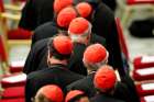 Cardinals wait for Pope Francis&#039; arrival at a gathering with young people and members of the Synod of Bishops at the Vatican Oct. 6.