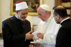 Pope Francis exchanges gifts with Ahmad el-Tayeb, grand imam of Egypt&#039;s al-Azhar mosque and university, during a private meeting at the Vatican May 23.