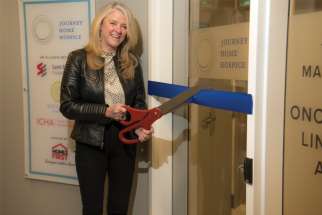 The Journey Home Hospice went from four to 10 beds in a renovated and expanded space in Toronto. St. Elizabeth Foundation director Nancy Lefebre cuts the ribbon.