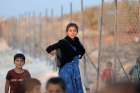 Displaced children are seen Sept. 11 at a camp in Idlib, Syria. 