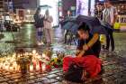 A girl in Turku, Finland, plays an instrument and sings a lullaby Aug. 18 at the site where one person was stabbed to death. Pope Francis asked an estimated 10,000 people in St. Peter&#039;s Square Aug. 21 to pray in silence and then to join him in reciting the Hail Mary for the victims of the attacks the previous week in Burkina Faso, Spain and Finland.