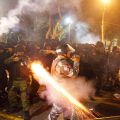 A riot policeman fires his weapon while confronting stone-throwing demonstrators during an anti-government protest in Belem, Brazil, at the mouth of the Amazon River June 20. Leaders of the Brazilian bishops&#039; conference announced their support for peacef ul demonstrations sweeping across South America&#039;s largest nation, but declined to say how they might affect World Youth Day activities and the visit of Pope Francis in July.