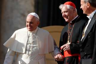 Pope Francis is pictured with Cardinal Gerhard Muller, prefect of the Congregation for the Doctrine of the Faith, during his general audience in St. Peter&#039;s Square at the Vatican Nov. 19. 