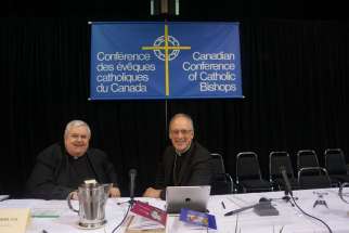 Msgr. Pat Powers, left, meets with CCCB president Archbishop Paul-André Durocher.  The CCCB announced that it will launch  a national campaign this fall to combat the legalization of euthanasia in Canada.