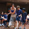 Three young boys from Our Lady of Fatima Catholic School eagerly take the opportunity to jig with Ginny Gonneau, a Métis descendant from Barrie.