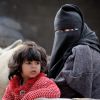 A mother and daughter are pictured in the market of the Nuseirat refugee camp in the middle of Gaza last year. The Vatican and the Palestine Liberation Organization are continuing talks aimed at a formal agreement regulating and promoting the presence and activity of the Catholic Church in the Palestinian territories.