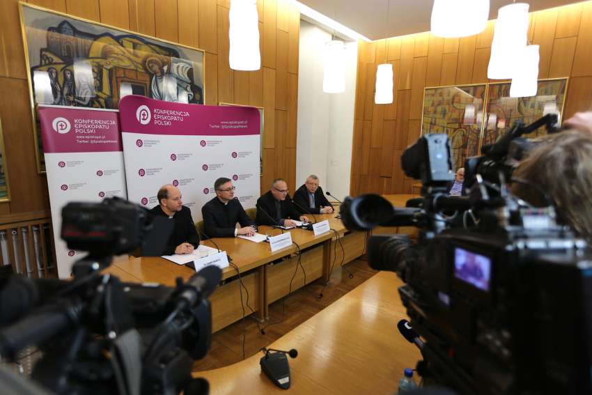 Father Leszek Gesiak, spokesman of the Polish bishops&#039; conference, left, is seen at a Jan. 9, 2024, press conference in Warsaw with university professors explaining church financing and taxation of clergy. The newly installed Polish government coalition, led by Prime Minister Donald Tusk, said it would abolish a state Church Fund as part of its reforms. Church leaders said Jan. 9 they were not contacted by the government to discuss such a move and they needed to clarify &quot;often inaccurate information on church financing or taxation of clergy.&quot;