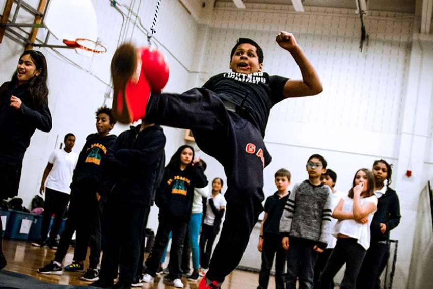 Jortany Martienz, a Grade 5 student from St. Joseph Catholic School in the Leslieville neighbourhood, participates in an event at his school&#039;s Northern Spirit Games Feb. 27.