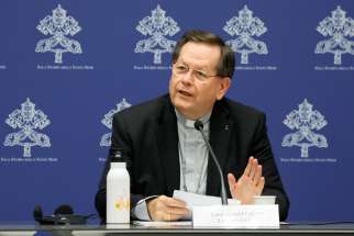 Canadian Cardinal Gérald C. Lacroix of Québec speaks during an Oct. 11, 2023, briefing about the assembly of the Synod of Bishops at the Vatican.