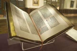 A future museum focusing on the Bible will also house ancient Holy Land artifacts from the Israel Antiquities Authority. In this photo, the Gutenberg Bible is shown.