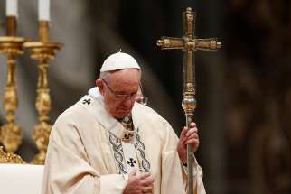 Pope Francis holds his pastoral staff during a Mass marking the feast of the Epiphany in St. Peter&#039;s Basilica at the Vatican Jan. 6, 2018.