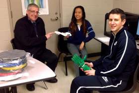 St. Francis Xavier Secondary School has renamed its athletic field after former chaplain Brian Finamore, left, for his indelible impact on the students and the school community.