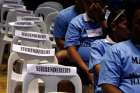 Filipino residents in Manila involved with illegal drugs wait to take a pledge that they will not use or sell narcotics after surrendering to police and government officials Aug. 18.