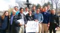 Darren Pereira, holding the sign on the left, visited the United Nations to address the global water crisis.