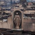 A statue of Mary stands amid the remains of homes destroyed by fire and the effects of Hurricane Sandy in the Breezy Point section of the New York borough of Queens Oct. 30. More than 80 homes were destroyed in the tiny beachfront neighborhood.