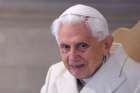 Retired Pope Benedict XVI attends the opening of the Holy Door of St. Peter&#039;s Basilica at the Vatican in this Dec. 8, 2015, file photo.