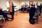 Vincent Cheng conducts the St. Michael’s Choir School alumni and MOSAIC choirs in rehearsal accompanied by Gordon Mansell on piano. 