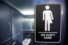 A sign indicating a unisex bathroom is seen in 2016 in North Carolina.