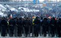 Protesters stand in front of a cordon of riot police near Independence Square in Kiev, Ukraine, dated Dec. 11, 2013.