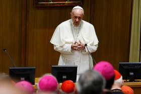 Pope Francis prays with participants at an encounter marking the 25th anniversary of the Catechism of the Catholic Church at the Vatican Oct. 11. The death penalty is &quot;contrary to the Gospel,&quot; the pope said in a speech at the meeting. 