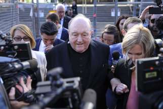 Archbishop Philip Wilson of Adelaide, Australia, leaves the courtroom after his May 22 conviction in covering up clergy sexual abuse. He was sentenced to one year detention on July 3.es next steps.