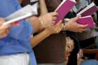 A boy attends Mass with his family at the Church of Sts. Peter and Paul in Singapore April 2, 2010. &quot;The scandals abroad are a wake-up call for us, as the Catholic Church in Singapore has not been spared allegations of child abuse,&quot; Singapore Archbishop William Goh said.