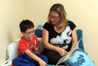 Strategies like asking open-ended questions promotes discussion and new vocabulary in children, according to Andrea Coke, the school board&#039;s chief language pathologist. A parent is shown discussing the book with her child in this screenshot of a board resource video.