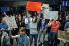 People gather for a protest at the Arrivals Hall of San Francisco&#039;s International Airport after people coming in from Muslim-majority countries were held Jan. 28 by border control as a result of the new executive memorandum by U.S. President Donald Trump.