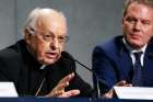 Cardinal Lorenzo Baldisseri, secretary-general of the Synod of Bishops, speaks during a Sept. 18 Vatican news conference to announce synod changes. Also pictured is Greg Burke, Vatican spokesman. Pope Francis has issued an apostolic constitution, updating the rules of how the synod is prepared for, conducted and implemented. 