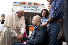 Pope Francis greets Giuseppe Chiolo, 16, in St. Peter&#039;s Square during a Year of Mercy general audience at the Vatican Sept. 10. The pope administered the sacrament of confirmation to the young man, who is being treated in the oncology ward of a Florence hospital.