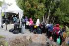 A group of Haitians wait to cross the U.S.-Canada border into Quebec from New York in late August. Advocates decried a Nov. 20 decision by Elaine Duke, acting secretary of the Department of Homeland Security, to end a program allowing 50,000 Haitian nationals to remain in the U.S. on July 22, 2019.