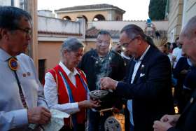 Sister Priscilla Soloman, a member of the Ojibway people and of the Sisters of St. Joseph of Sault Ste. Marie in Ontario, Canada, and Alessandro Martire, a lawyer for the Lakota Sioux, participate in an indigenous prayer at the Jesuit General Curia in Rome Oct. 17, 2019. Both participated in a meeting of indigenous peoples from North America and South America that was a side event to the Synod of Bishops for the Amazon.