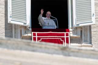 Pope Francis speaks from a window at the Vatican overlooking St. Peter&#039;s Square during the Angelus July 19, 2020. The pope expressed his concerns about increased tensions at the Armenia-Azerbaijan border.